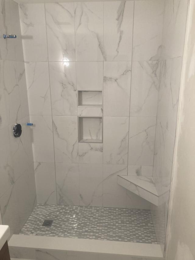 Two Marble Walk-in Showers